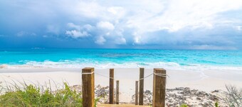 Cozy two-bedroom two bathroom on white sandy beach