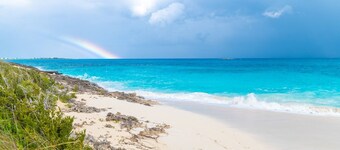 Cozy two-bedroom two bathroom on white sandy beach