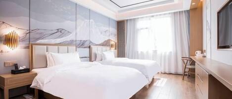 A modern hotel room with two beds, a desk, and a large window.