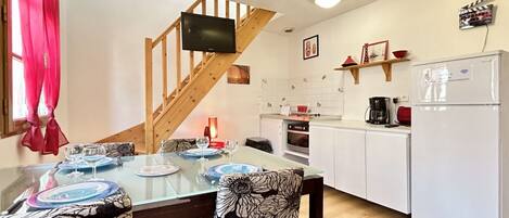 Fridge, coffee/tea maker, cookware/dishes/utensils