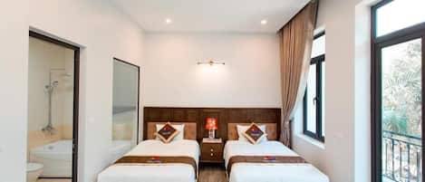 Habitación Deluxe con 2 camas individuales | Escritorio, espacio para trabajar con laptop y wifi gratis