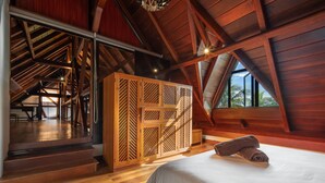 A bedroom with a wooden ceiling, a bed, and a large window. - Villa Matahari by muse villas (Black River)