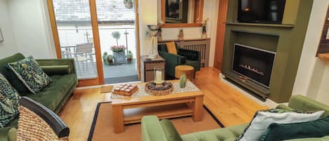 Cottage | Living area | Fireplace, video game console, DVD player