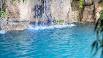 Indoor pool, seasonal outdoor pool, pool umbrellas, pool loungers