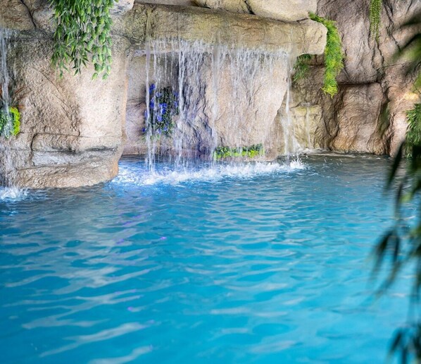 Indoor pool, seasonal outdoor pool, pool umbrellas, pool loungers