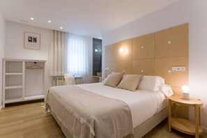 2 habitaciones, tabla de planchar con plancha y internet 