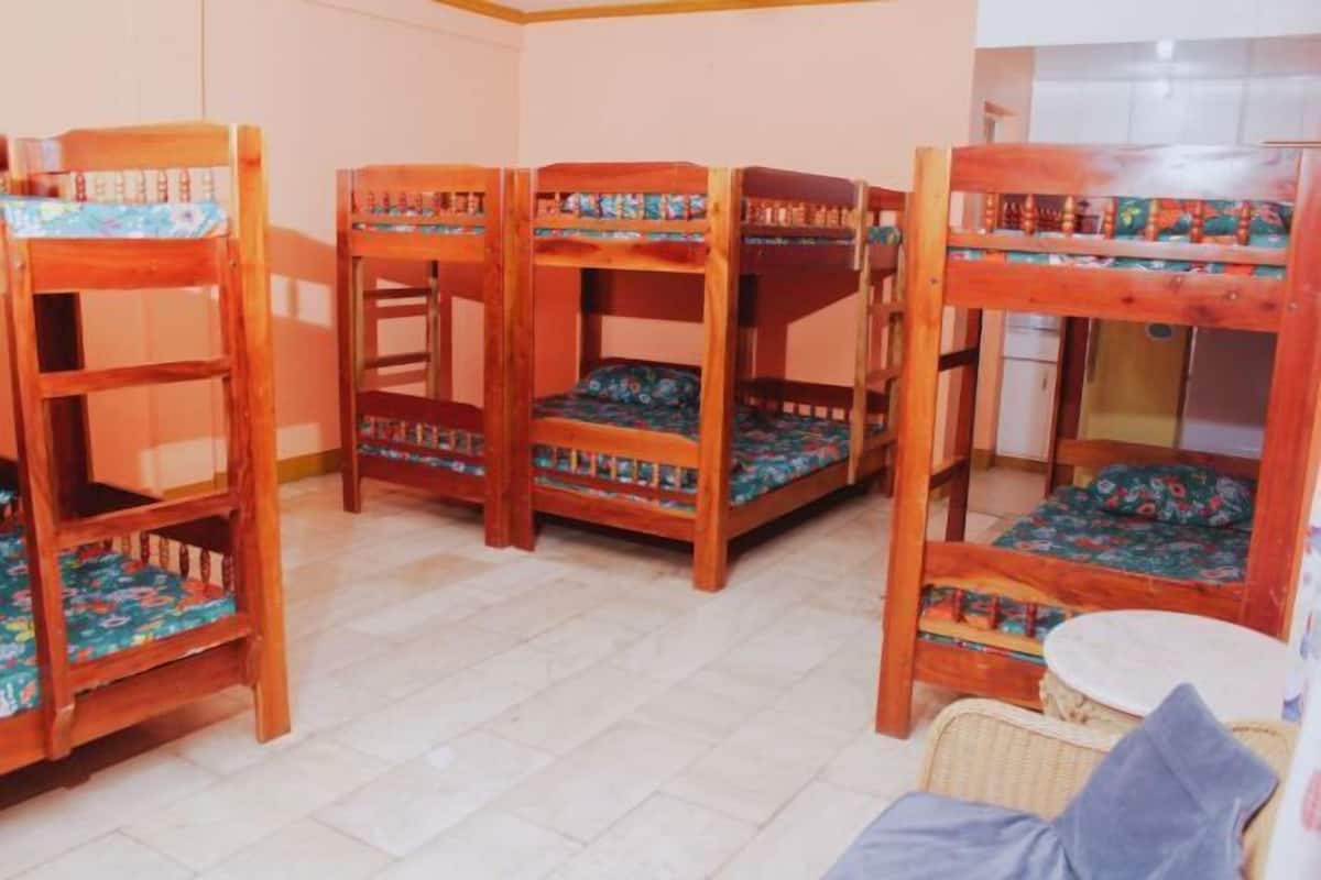 1 bedroom, desk, bed sheets
