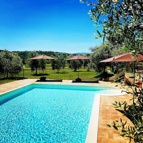Seasonal outdoor pool, open 7:00 AM to 7:00 PM, pool umbrellas. Casale Rancaglia