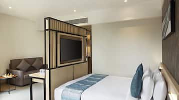 Premium bedding, memory-foam beds, minibar, in-room safe