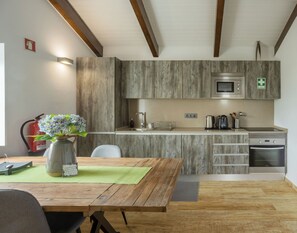 High chair, dining tables - Stylish 1 Bedroom Stone House On Ocean Front - São Jorge, Azores (Bela Lua) (Calheta)