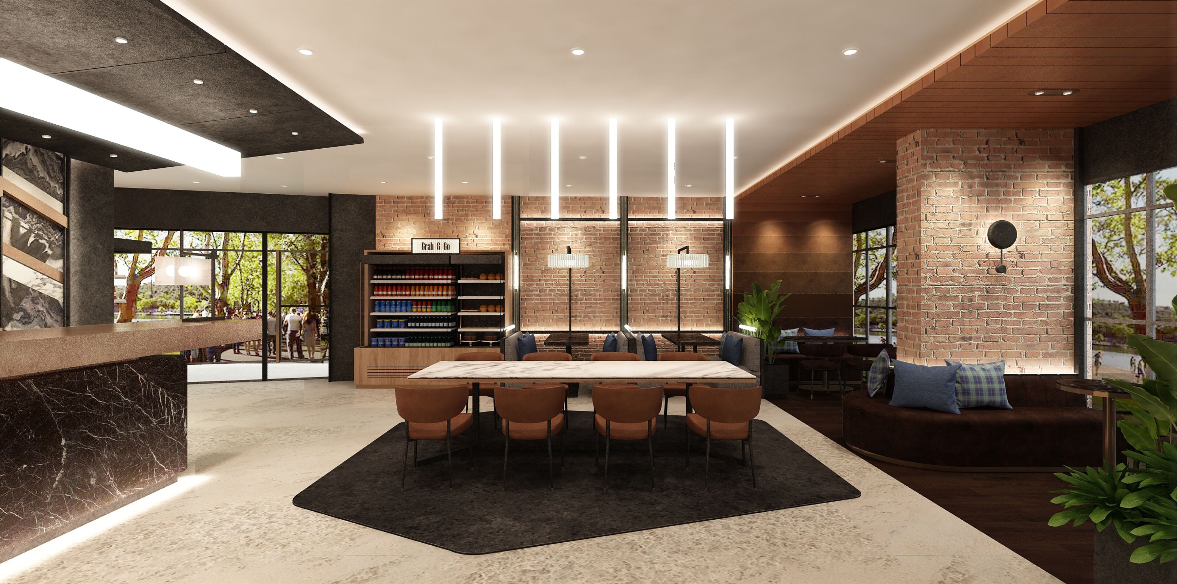 Un interior moderno con zona de comedor, pared de ladrillo y mostrador de recepción.