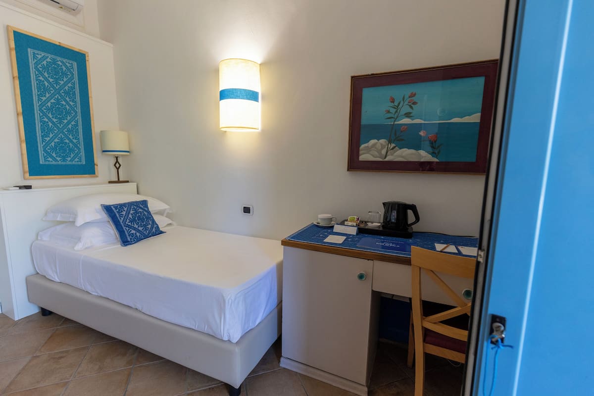 1 chambre, couette en duvet d'oie, surmatelas, minibar