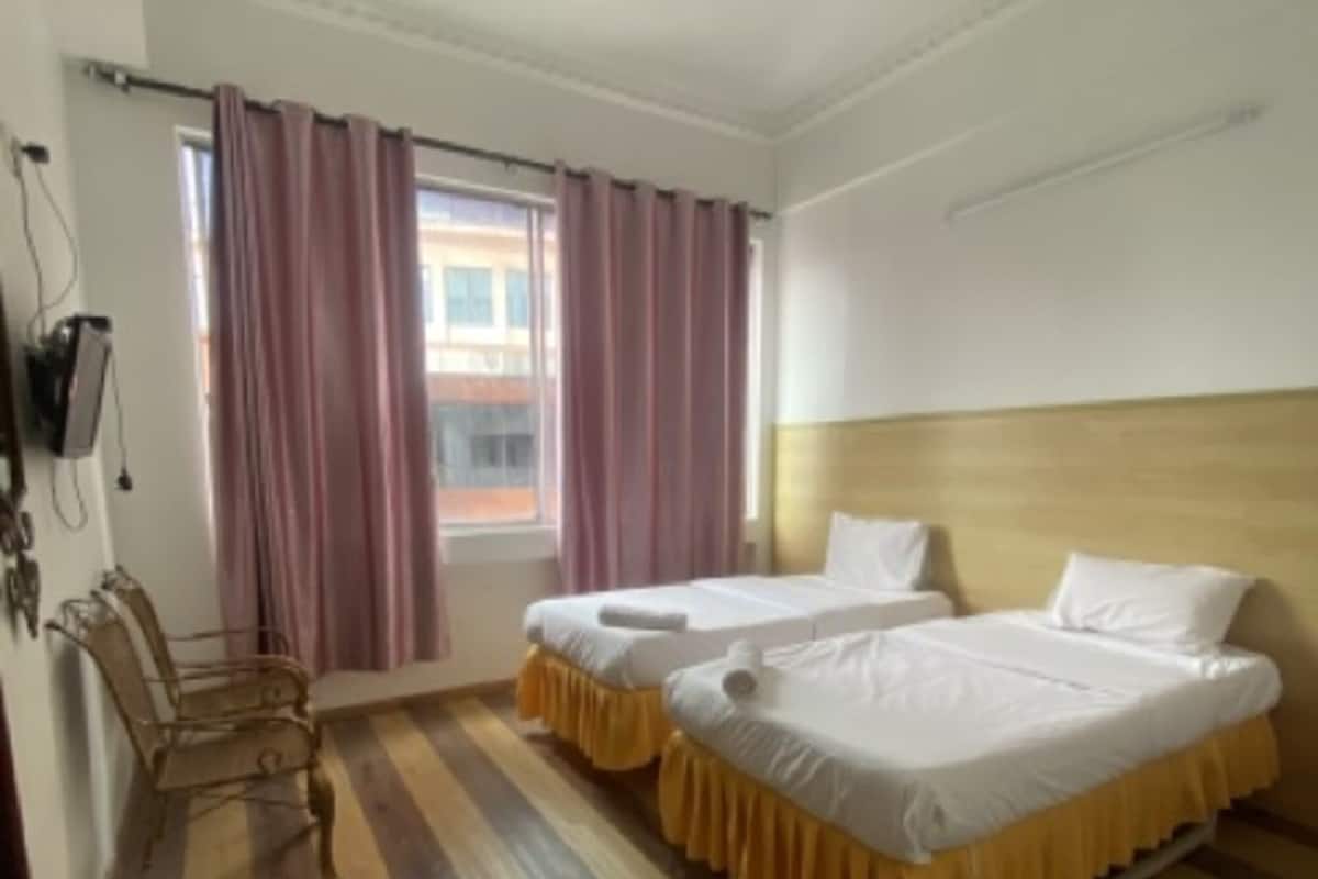 Chambre Deluxe avec lits jumeaux | 1 chambre, Wi-Fi gratuit, draps fournis