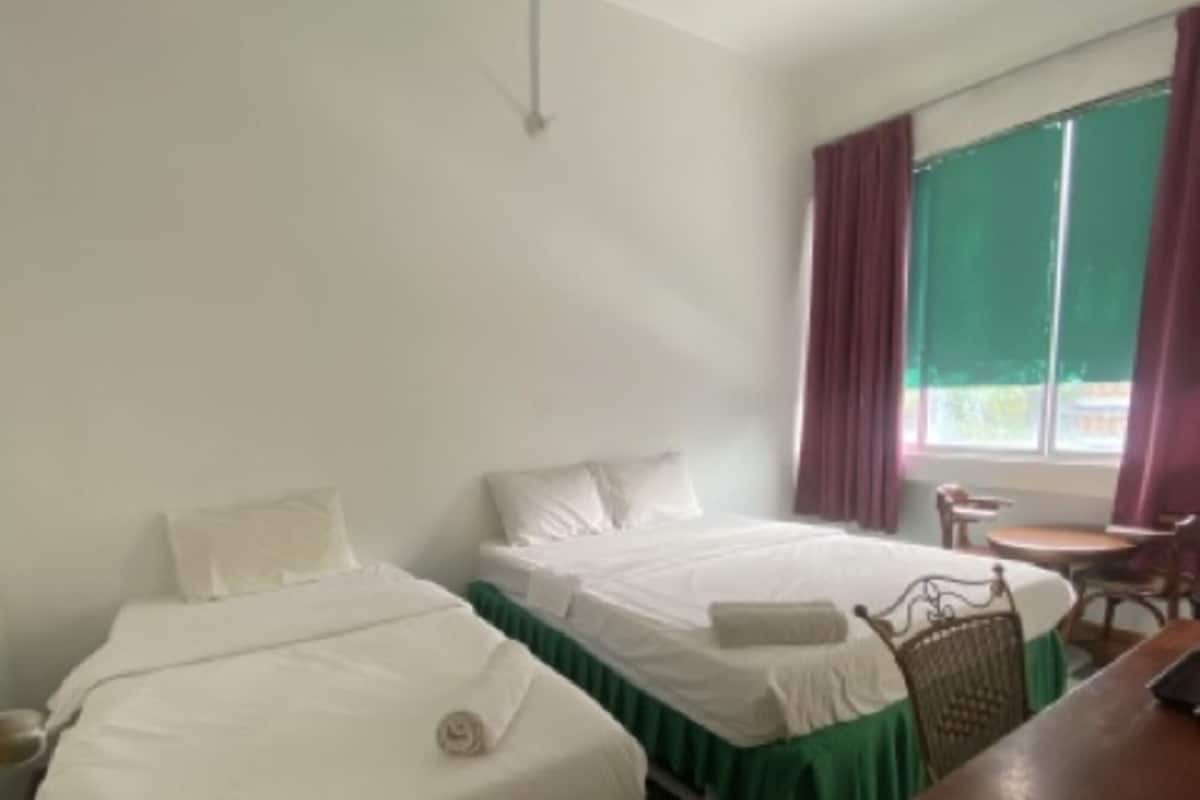 Chambre Triple Deluxe | 1 chambre, Wi-Fi gratuit, draps fournis