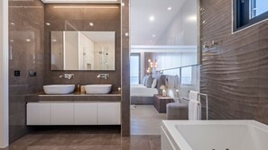 Bathtub, hair dryer, towels