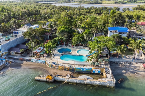 Private beach, free beach cabanas, beach umbrellas, beach bar