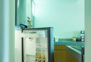 Fridge, microwave, stovetop, coffee/tea maker