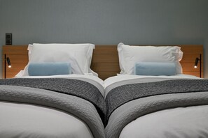 Egyptian cotton sheets, premium bedding, down comforters - The Lop Athens Holiday Luxury Suites (Palaio Faliro)