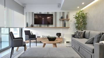 Deluxe-Suite | Wohnbereich | Smart-TV
