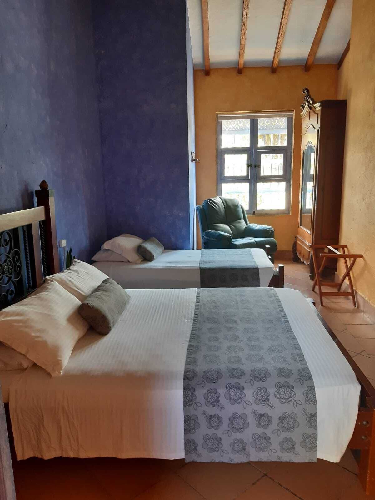 family room | minibar, in-room safe, blackout curtains, free wifi