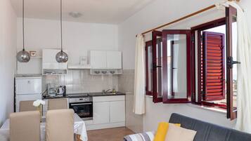 Apartment (One Bedroom Apartment with Balcony an) | Private kitchen | Fridge