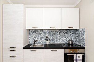 Apartamento (One-Bedroom Apartment with Terrace) | Cozinha privada | Geladeira