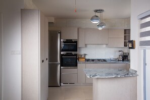 Apartment, Multiple Beds | Private kitchen - 3-bedroom Apartment in Tema - Chez Akwasi (Tema)