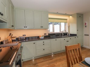 Fridge, dishwasher, cookware/dishes/utensils