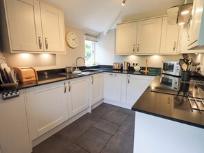 Cottage | Private kitchen | Fridge, dishwasher, cookware/dishes/utensils - The Smithy (Keswick)