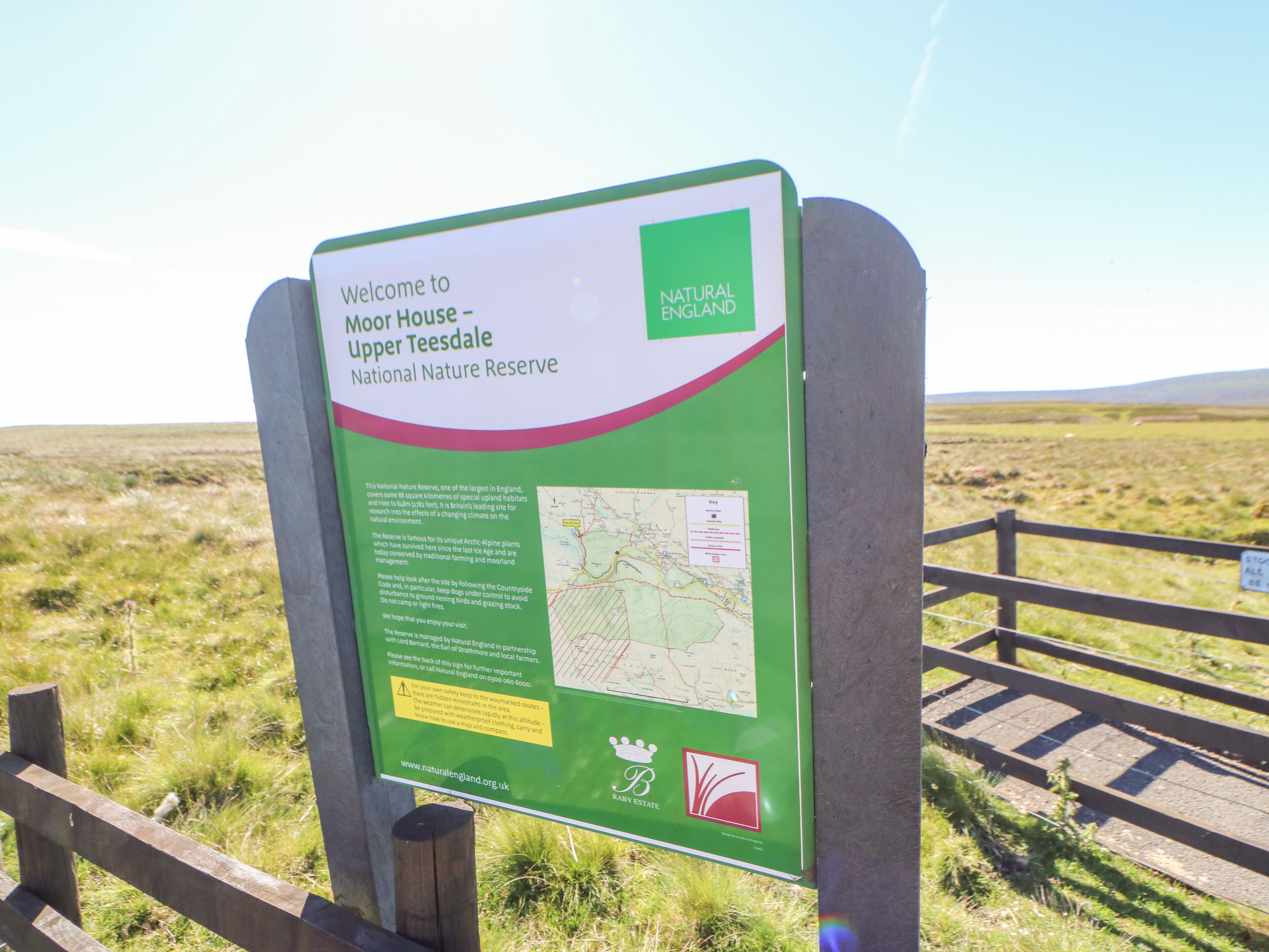 A sign welcoming visitors to Moor House Upper Teesdale National Nature Reserve.