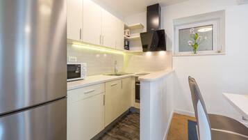 Apartment (Two Bedroom Apartment with Balcony an) | Private kitchen | Fridge