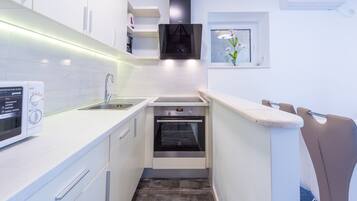 Apartment (Two Bedroom Apartment with Balcony an) | Private kitchen | Fridge