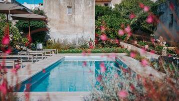 Seasonal outdoor pool, pool umbrellas, sun loungers