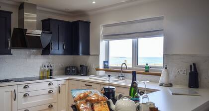 Uninterrupted views over Coll Beach and sea views out over Broadbay.