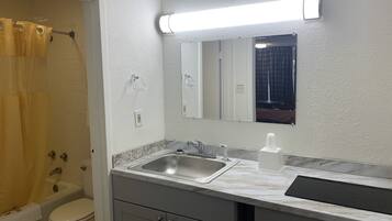 Full-sized fridge, microwave, stovetop