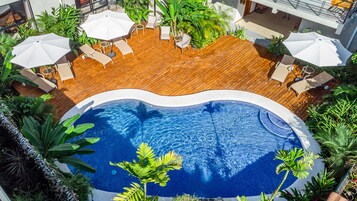 Outdoor pool, open 8:00 AM to 8:00 PM, sun loungers