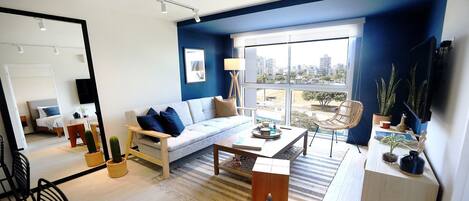 Comfort Apartment | Living area | 50-inch Smart TV with digital channels, TV