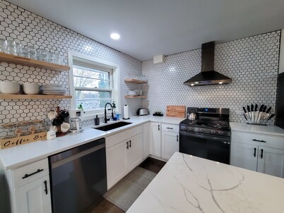 Spacious open concept home w/ game room + firepit