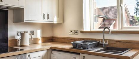 Dishwasher, high chair, cookware/dishes/utensils