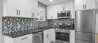 Luxurious Renovated Home with New Hot Tub: By Stadium, Expo Center, and Skiing.