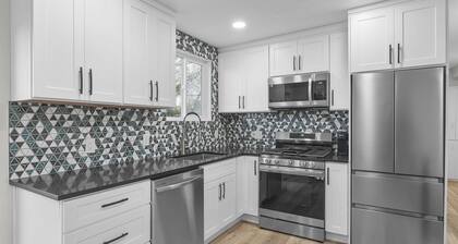 Luxurious Renovated Home with New Hot Tub: By Stadium, Expo Center, and Skiing.