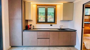 Fridge, microwave, dishwasher, coffee/tea maker