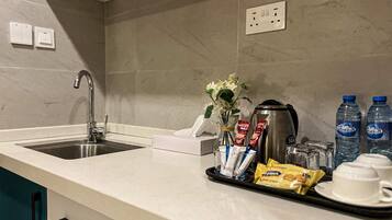 Deluxe Double or Twin Room | Private kitchen | Full-size fridge, microwave, oven, electric kettle