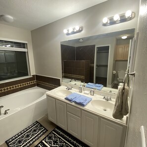 Combined shower/tub, jetted tub