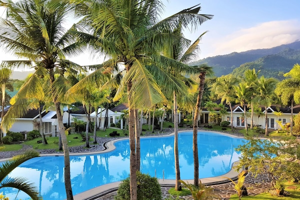 Indoor pool, outdoor pool, open 7:00 AM to 9:00 PM, pool loungers
