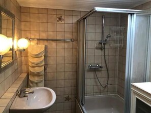 Bathtub, hair dryer, towels