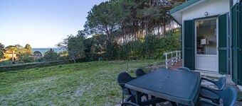 Rustic Villetta Le Grotte sleeps 8 comfortably with a view of the bay of Portoferraio