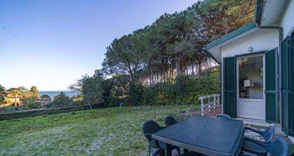 Rustic Villetta Le Grotte sleeps 8 comfortably with a view of the bay of Portoferraio