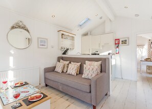 Living area - This chic country style beach hut is ideal for a romantic escape by the sea. (Hele Bay, Ilfracombe)