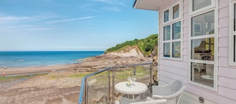 This chic country style beach hut is ideal for a romantic escape by the sea.